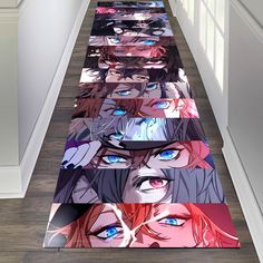 a long hallway with many different colored images on the floor and one has blue eyes