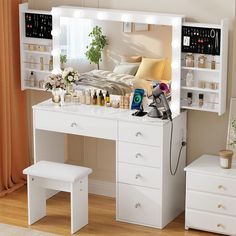 a white vanity table with drawers and lights on the top, along with two stools in front of it