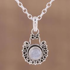 Beautifully dreamy, this gorgeous pendant necklace comes from talented designer Aparna. Like a full moon wavering amidst the clouds, a cabochon of rainbow moonstone shimmers with elegance from within a bezel setting, accented with a dainty rope motif. The beautiful pendant is crafted by hand, with swirls and orbs of sterling silver enveloping the opulent gemstone. Moonstone Pendant Necklace, Rainbow Moonstone Pendant, Jewelry Workshop, Blue Pendant, Moonstone Pendant, Sterling Silver Necklace Pendants, Traditional Jewelry, Favorite Rings, Jewelry Packaging