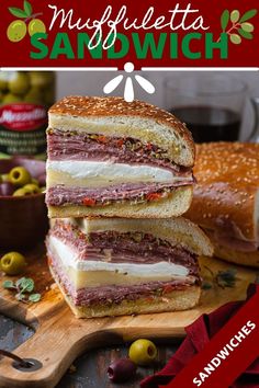 two sandwiches stacked on top of each other with olives in the background and text overlay