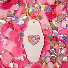 white keychain with purple heart and rainbow Funky Mirrors, Motel Keychain, Funny Keychain, Pink Border, Friends Laughing, Upgrade Your Look, College Gifts, Bachelorette Gifts, Gifts Under 10