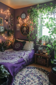 a bedroom with purple walls and plants on the windowsill, lights strung from the ceiling