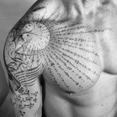 a man with lots of writing on his chest