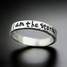 This listing comes with one personalized phrase ring saying "I am the storm". These rings are 3mm wide. They are composed of silver pewter and are non-tarnishing and hypoallergenic. Pewter is lightweight and incredibly comfortable.  You can choose to add a swarovski birthstone, which I will put to the left of the word of your choice unless otherwise specified. ♥ Your purchase will arrive in an organza bag nestled inside a lovely cotton filled gift box wrapped with beautiful ribbon ready for gift Warrior Jewelry, Motivational Jewelry, I Am The Storm, Gold Envelopes, Three Rings, Hand Stamped Jewelry, Star Ring, Stamped Jewelry, Jewelry Silver