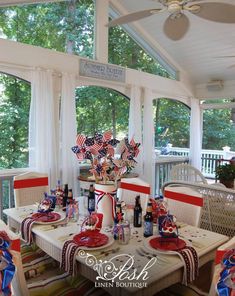 a dining room table with red, white and blue decorations