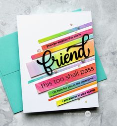 a card with the words friend written on it and some colored strips in front of it