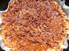 a pecan pie sitting on top of a pan