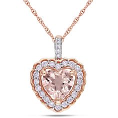 This lovely heart necklace by Miadora features a heart-shaped center morganite surrounded by bright white diamonds. The necklace is set in 10-karat pink gold with and includes a matching chain. Rose Gold Morganite, Heart Necklace Diamond, Silver Heart Pendant, Local Jewelry, Lovely Jewellery, Silver Pendants, Rose Gold Earrings, Diamond Heart