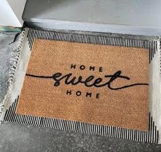 a door mat that says home sweet home