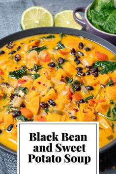 black bean and sweet potato soup in a pan with spinach, carrots, and other vegetables