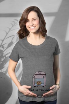 Celebrate the sweet expectation with our 'Bun in the Oven' maternity t-shirt! This funny shirt features a playful visual pun, making your pregnancy journey even more delightful. Crafted from super soft, high-quality ringspun cotton, it ensures lasting comfort beyond your baby bump's journey. With ruched sides and available in five sizes, fitting comfortably into this beauty is a breeze. Share the joy of your little bun with the world – order this maternity tee today! 🍞🤰 #MaternityFashion Happy Camper Tshirt, Camper Tshirt, Funny Maternity, Maternity Shirts, Funny Pregnancy Shirts, Fall Shirts Women, Bun In The Oven, Maternity Shirt, Maternity Tees