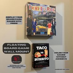 two board games are hanging on the wall next to each other, including taco vs burrito and ticket to ride