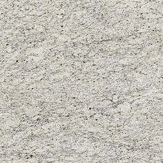 a close up view of a white granite surface