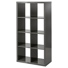 an empty bookcase with four shelves on each side