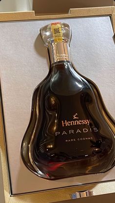 a bottle of hennesy paradis in a box