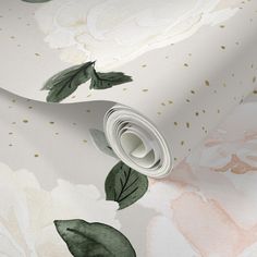 pink and gold floral wallpaper with green leaves on the bottom half of the wall