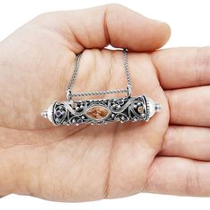 "A most meaningful Jewish jewelry item, this sterling silver mezuzah pendant carries much significance.  The Mezuzah is found on the doorposts of Jewish homes. The mezuzah holds the parchment on which the verses of Shema Yisrael are written.  The pendant is crafted with delicate filigree work, created in the traditional Yemenite filigree style, which has been practiced in the artist's family for generations.  Carrying this pendant close to one's heart is a reminder of this commandment and of the Jewish Mezuzah, Hamsa Jewelry, Jewish Jewelry, Filigree Necklaces, Yellow Gold Jewelry, White Gold Jewelry, Rose Gold Jewelry, Jewelry For Her, Multi Stone