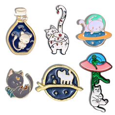 six different enamel pins with cats and aliens on them