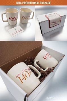 two coffee mugs in a gift box with the words love on them