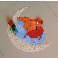 there is a cake with an image of two people sleeping on the moon