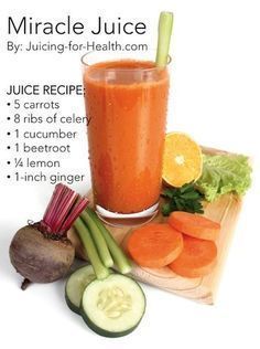 a smoothie is shown with carrots, celery and cucumbers