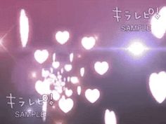 the blurry image shows many hearts in different colors and sizes, as well as words that say sample