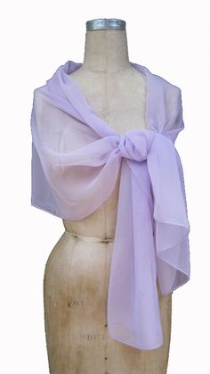 "Chiffon shawl great complimentary for you outfit. Large size of this shall allow to wear it as wrap; light weight of fabric will making elegant draping on your shoulders. Polyester fabric prevent from appearing wrinkle when wearing. Wrap, tie to make unique design as desire. Size around 17\" x 70\" Color: Lavender Fabric: Iridescent Chiffon /Poly Please contact with any questions." Elegant Silk Chiffon Scarves For Summer, Elegant Silk Shawl Scarf For Summer, Elegant Summer Shawl Wrap, Elegant One Size Wraps For Spring, Elegant Purple Silk Scarf For Wedding, Formal Summer Shawl, Elegant Wrap For Spring, Chic Summer Wedding Scarves, Elegant Summer Wrap