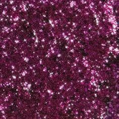 purple glitter sparkles in the air and looks like it's going to fall