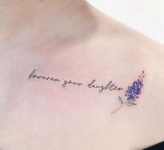 a woman's chest with a tattoo that says, forever your laughter on it