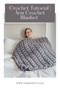 a woman laying in bed under a crochet blanket with text overlay that reads, crochet tutor arm crochet blanket