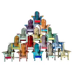 a bunch of chairs that are stacked on top of each other in the shape of a pyramid