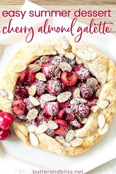 an easy dessert with cherries and almonds is shown on a white platter