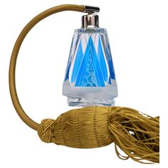 a blue bottle with a rope around it