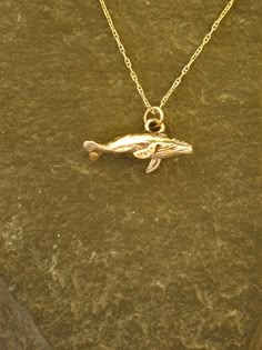 "This solid 3 Dimensional Humpback Whale pendant is 14K Gold. The included chain is a 14K Gold chain. You may choose 16, 18 or 20 inch at the same price. Other length available at sightly higher prices. The whale pendant measures 7/8\" long by 7/16\" tall. I hand cast all my pieces using the lost wax casting method. Please ask your needs. You may call me with questions, often I am out so please use my machine. 831-476-3176. Satisfaction Guaranteed! I send items USPS First Class unless otherwise Whale Pendant, Surf Jewelry, Piercings Jewelry, The Whale, Humpback Whale, Wax Casting, Lost Wax Casting, Jewelry Lookbook, Hand Cast