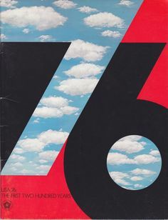 a book with an image of the sky and clouds in red, black, and blue