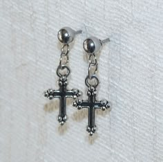 "Cross earrings. Antique silver tone double sided cross charms dangling on stainless steel earring studs with rubber backs. Earring length: 24mm (including the ball); 1\" Cross size: 15mm x 9mm This listing is for one pair of cross earrings with rubber backs. This earring will come in a gift bag. I offer combined shipping costs which gives you a shipping discount for ordering multiple items from my shop. Earrings care: Take them off while you sleep, sport activities, bathing, having a shower. Av Rubber Earrings, Cross Accessories, Stainless Steel Earrings Studs, Sport Activities, Tiny Cross, Earrings Antique, Crystal Dangle Earrings, Earring Studs, Funky Jewelry