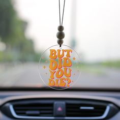 an image of a car dashboard decoration with the words but did you die?