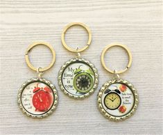 four different key chains with pictures on them