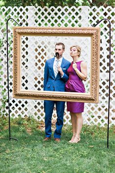 a man and woman standing next to each other in front of a picture frame with the words, wedding wish for bride