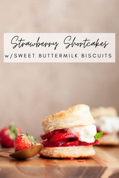 strawberry shortcakes with sweet buttermilk biscuits on a cutting board next to strawberries