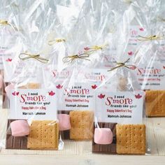 some kind of cracker with pink marshmallows on them in plastic bags