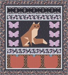 a dog is sitting in the middle of a quilt