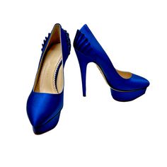 Charlotte Olympia Women's Paloma Blue Silk Satin Platform Pumps With Box Features Include Classic Almond Toe Sits Atop 1 1/4" Silk Covered Island Platform. 5 3/4" Covered Heel; 4 1/2" Equivalent. "Dolly" Is Made In Italy. 100% Authentic/See Tags Attached. Comes With Matching Tights. Size Us: 5.5 / Size Eu: 36 New Retail: $975.00 Hassle-Free No Cost Returns Shop With Confidence Trusted Seller, Selling Fashion For Over 25 Years Formal Fitted Blue Heels, Blue Fitted Heels For Gala, Elegant Blue High Heels, Chic Blue Heels For Gala, Chic Blue Wedding Shoes For Evening, Elegant Royal Blue Formal Heels, Elegant Royal Blue Fitted Heels, Elegant Royal Blue Evening Heels, Luxury Blue Heels For Galas