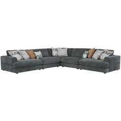 a gray sectional couch with pillows on it's back and arms, facing the camera