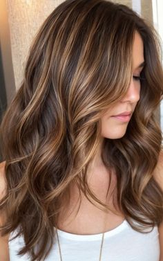 Achieve a sun-kissed glow with these 17 honey brown hair color ideas. Perfect for any season, these styles will brighten up your look. Blonde To Caramel Hair Before And After, Dark Brown Hair Golden Highlights, Dark Brown Hair With Honey Balayage, Gold Highlights Brown Hair, Brown Hair With Warm Highlights, Brown Gold Hair, Medium Brown Hair With Highlights, Brunette Inspiration, Golden Highlights Brown Hair