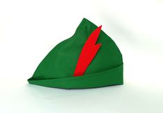 a green hat with a red lightning bolt on it