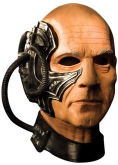 an old man wearing a mask with wires attached to it's face and head