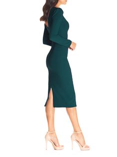 Display elegance and confidence with the Nadia dress in Pine. Featuring a high round neckline, long sleeves that puff at the shoulder, and a form-fitting silhouette. With a front slit, and back slit detail that zip and unzip to your preferred length. Perfectly styled for modest to modern occasions. Modest Night Dress, Modern Long Sleeve Cocktail Dress, Modest Cocktail Dress, Burgundy Cocktail Dress, Dress Display, Business Formal Dress, Work Dresses, Form Fitting Dress, Classy Casual