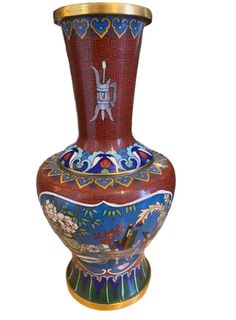 an ornate vase with decorative designs on it