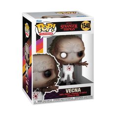 a pop vinyl figure in a box with an image of a creature on it's face